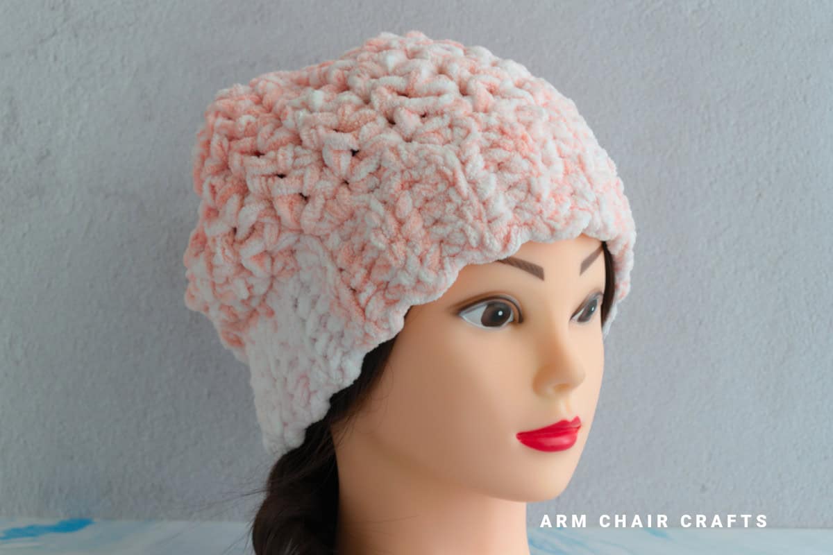 Pink crochet beanie.
