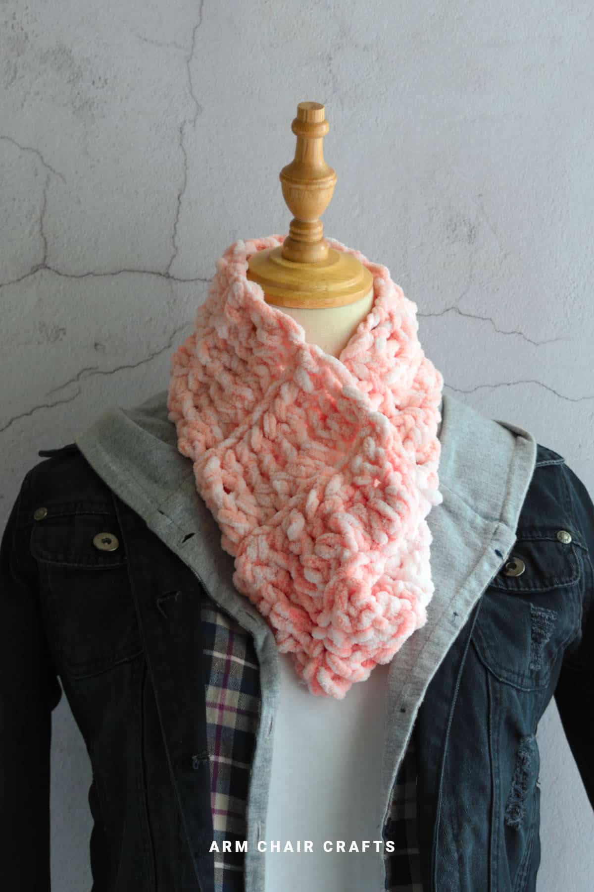 Crochet cowl on a mannequin.