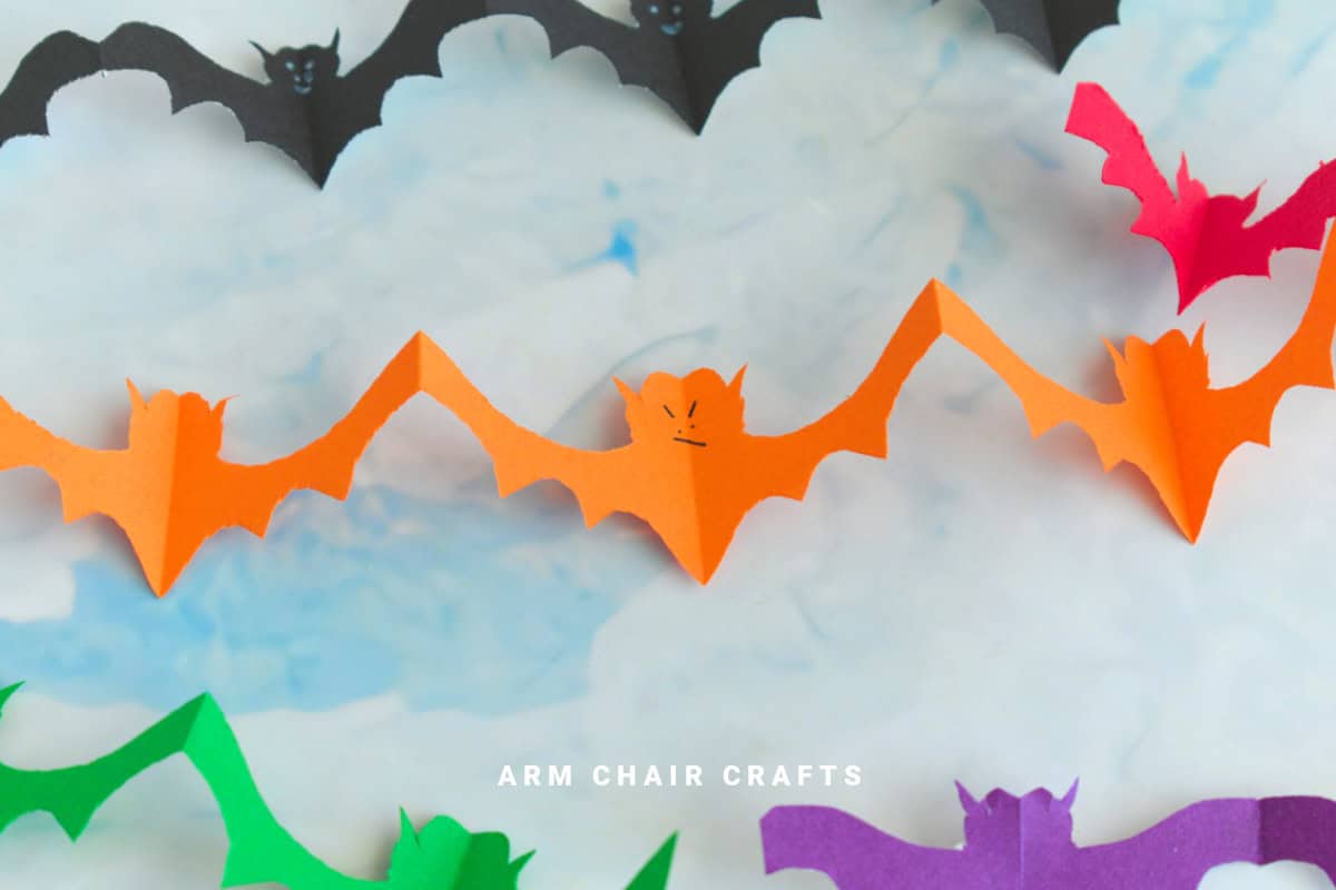 Close up image of an orange bat paper chain.