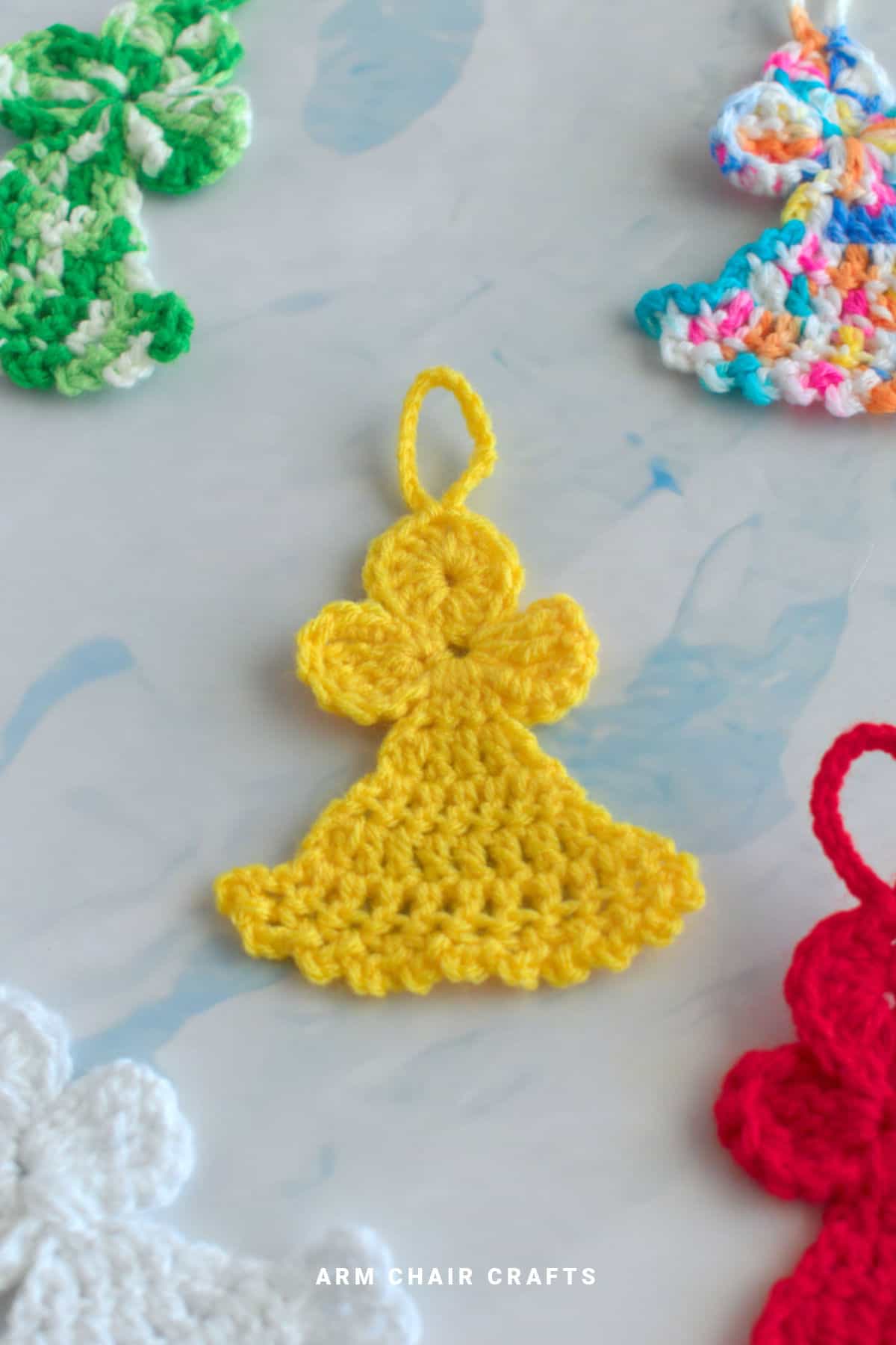 Yellow crochet angel.