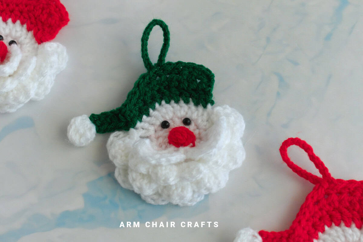 Crochet Santa with green hat.