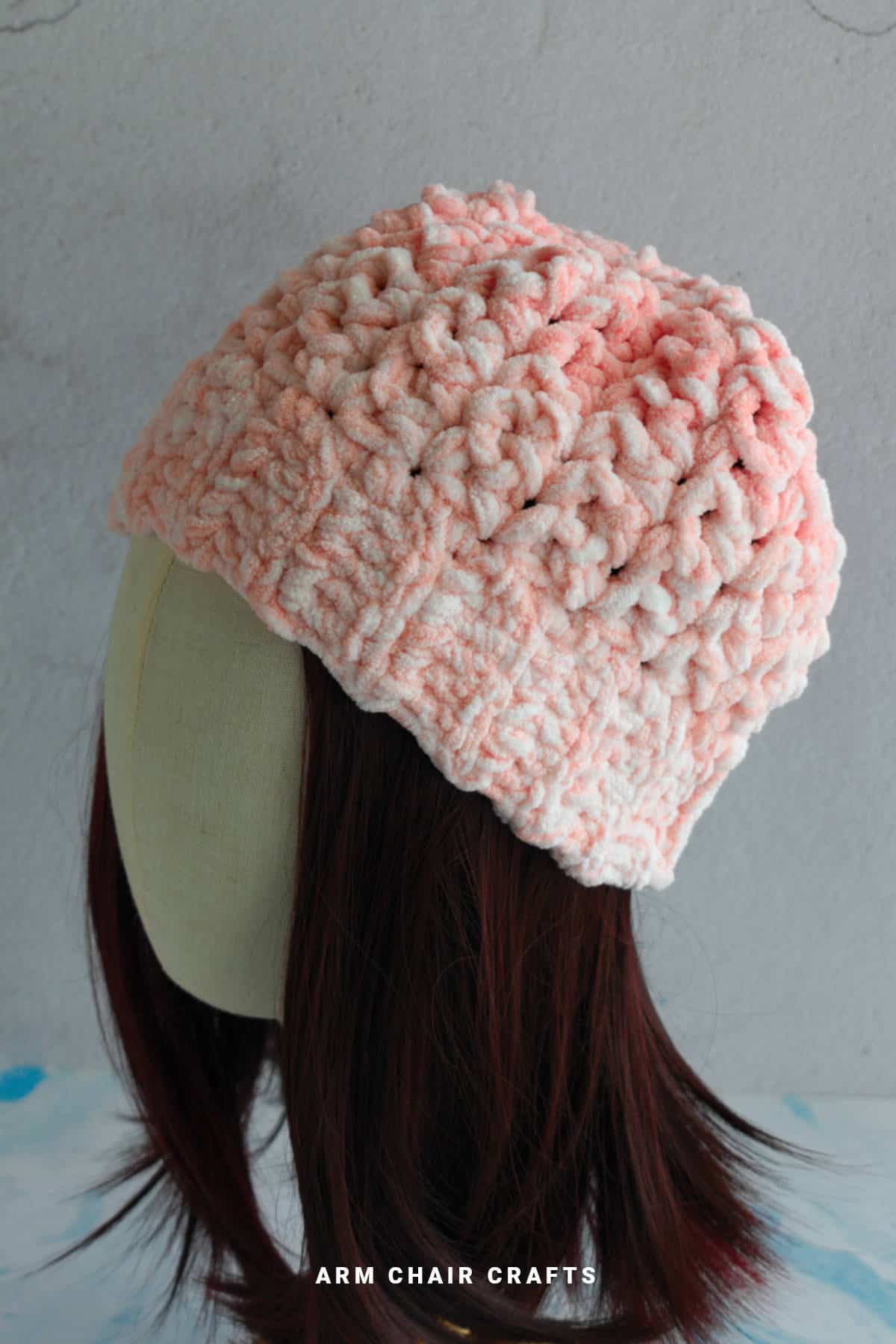 Close up image of a crochet beanie.