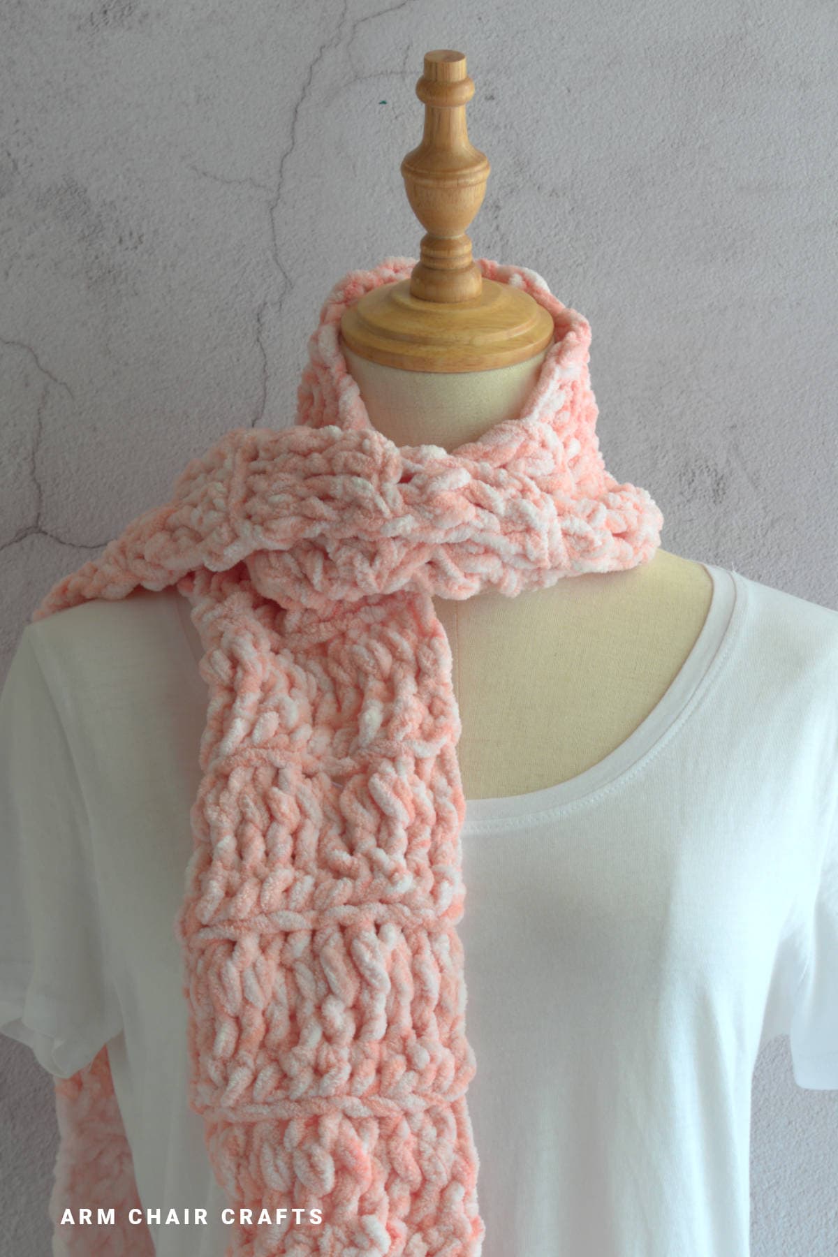 Close up image of a crochet scarf.