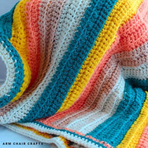 Close up image of a crochet blanket.