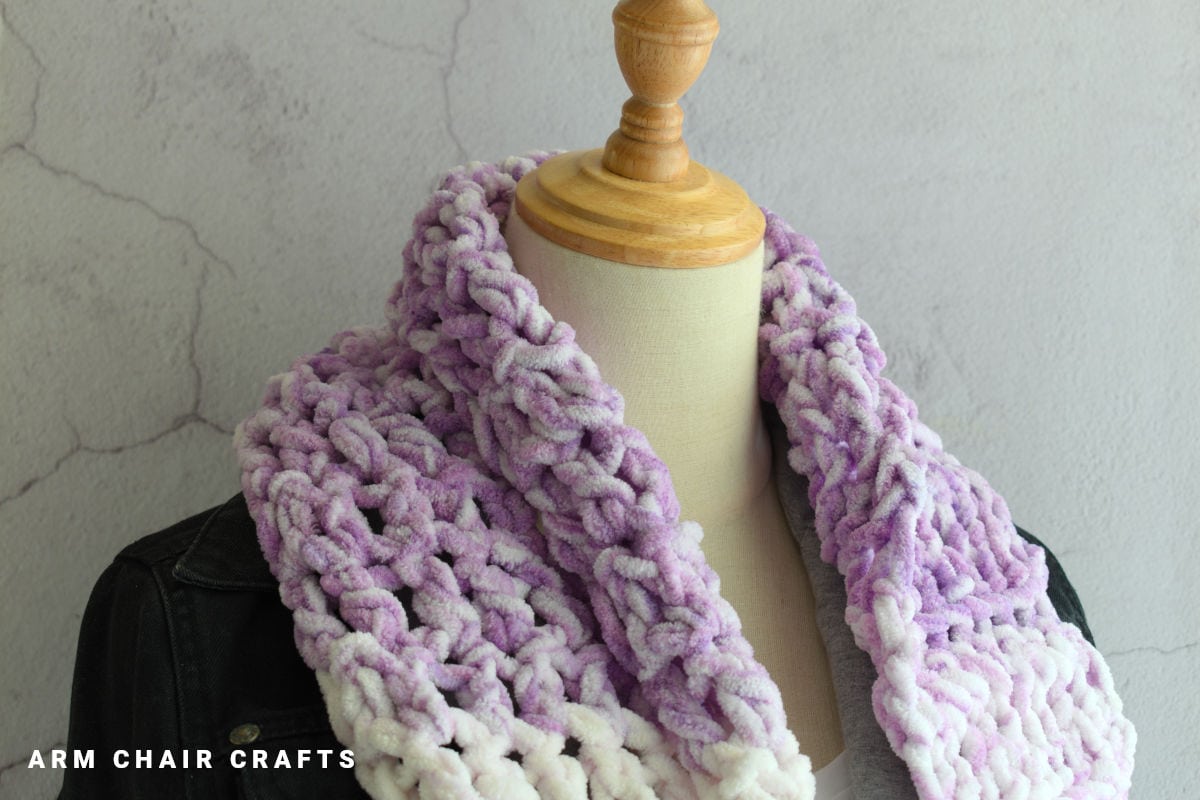 Close up image of a crochet scarf.