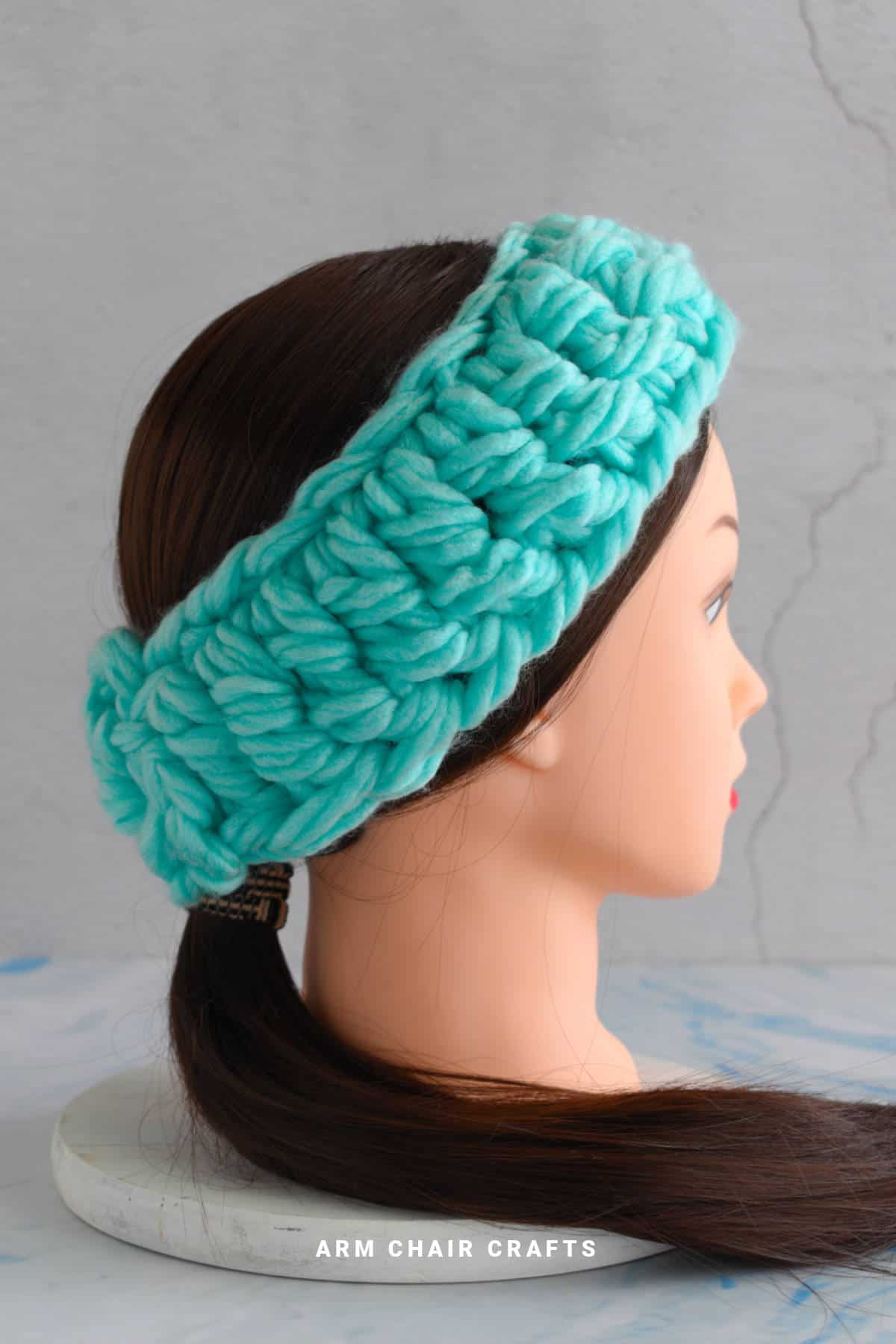 Close up image of a crochet headband.