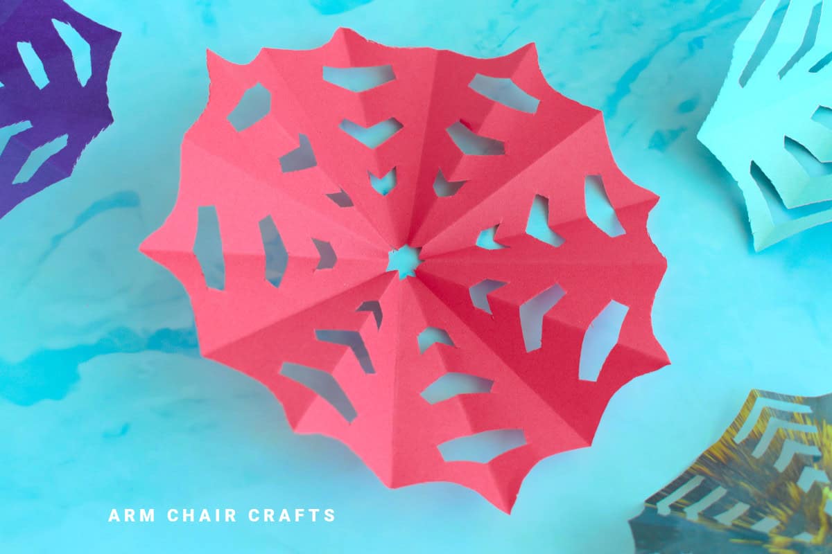 Red paper spiderweb.