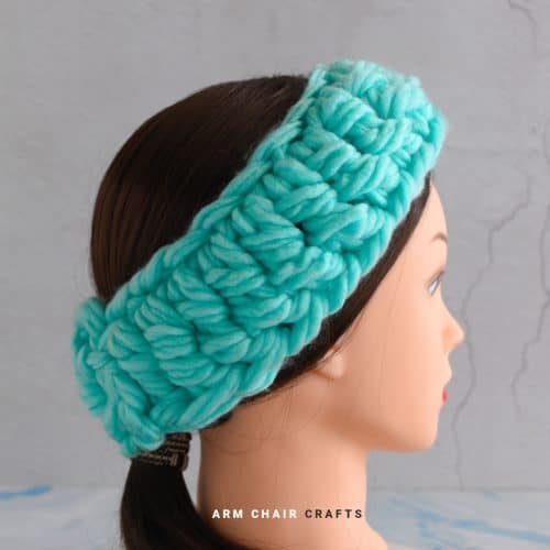 Close up image of a crochet headband.