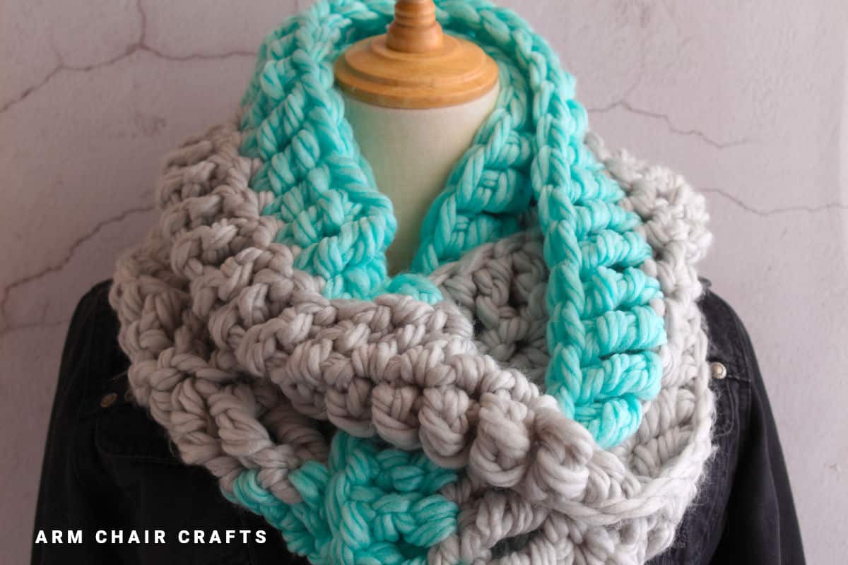 Blue and grey crochet infinity scarf.