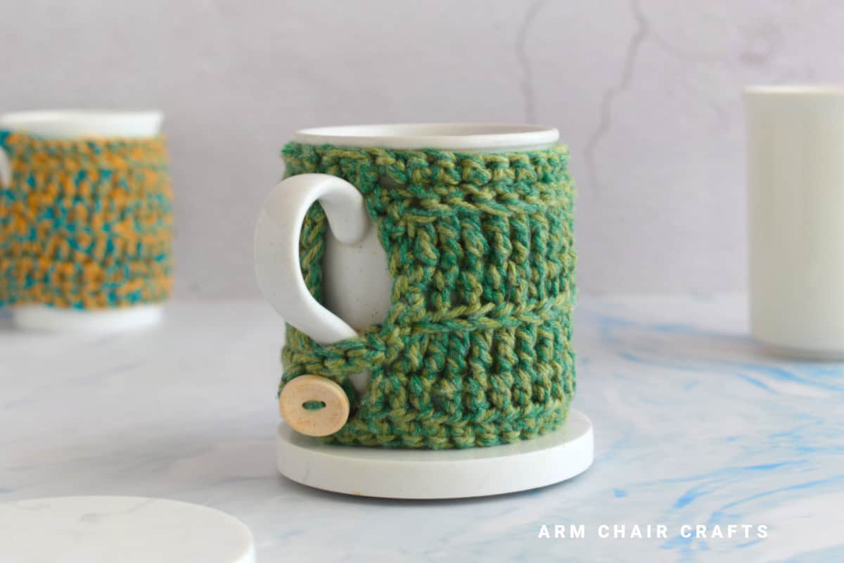 Green crochet mug cozy.