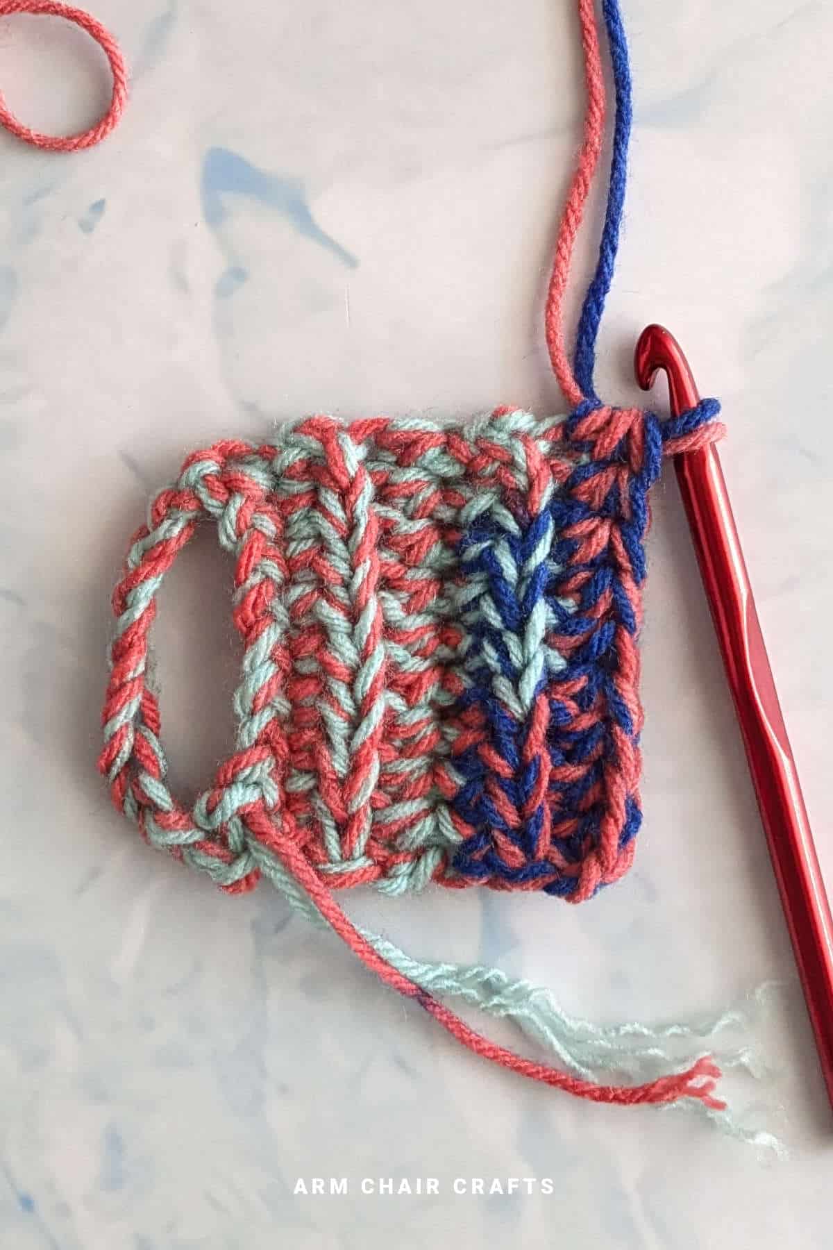 Process of making a crochet mug cozy.
