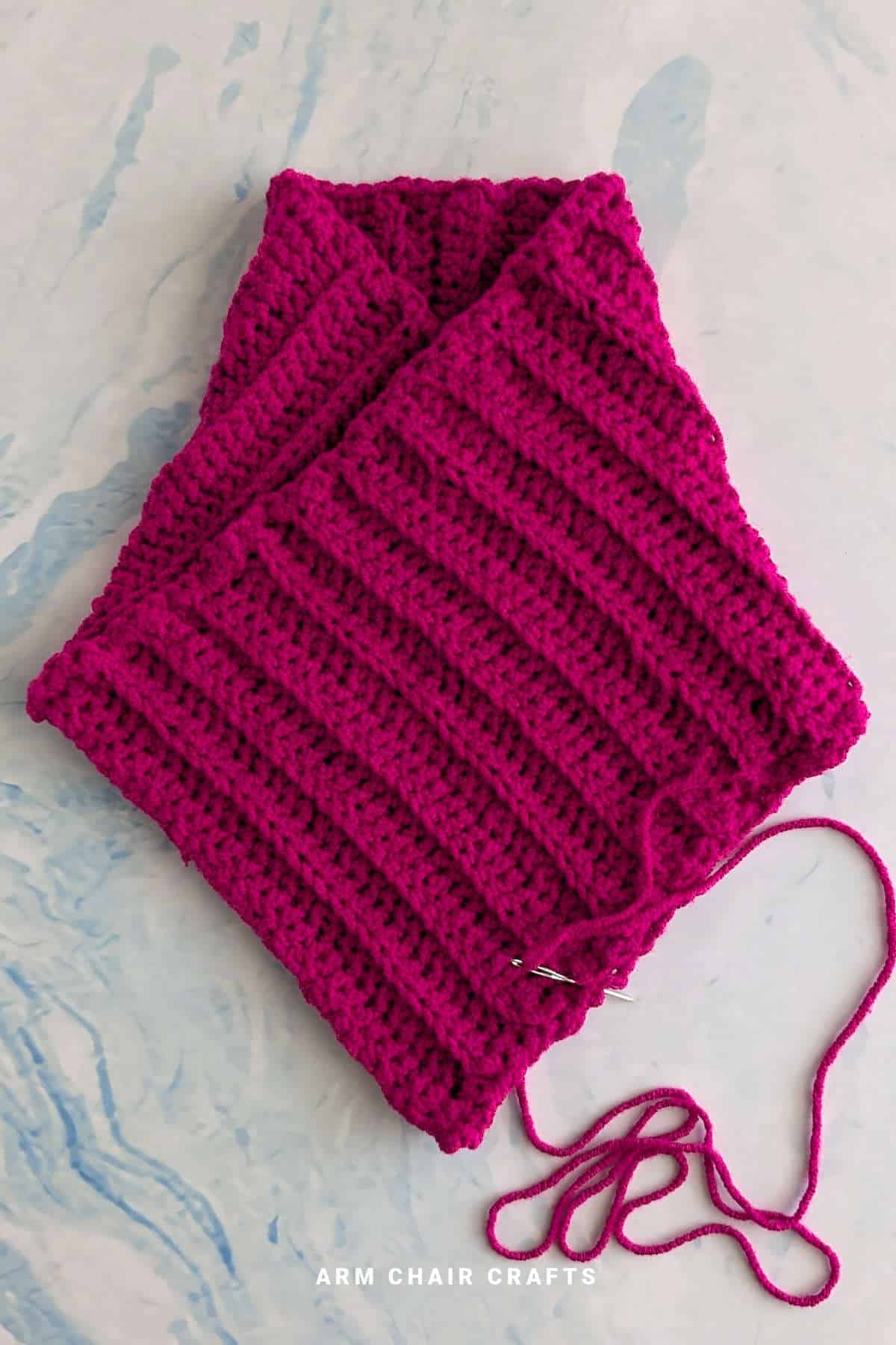 Pink crochet cowl.
