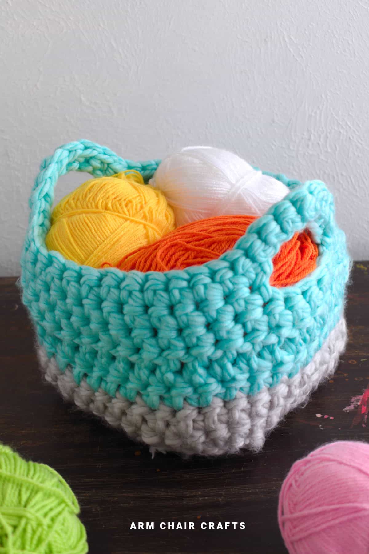 Crochet basket with yarn inside.