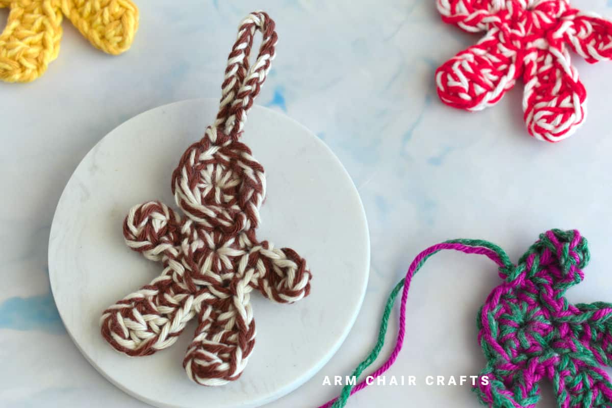 Close up image of crochet gingerbread men.