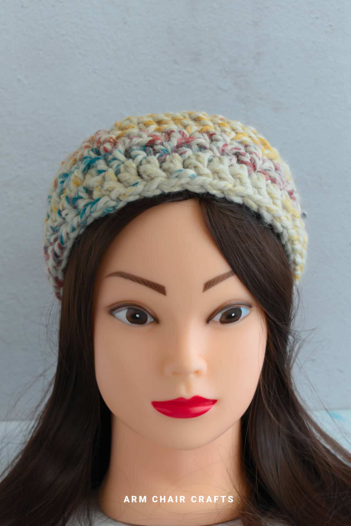 Close up image of a chunky crochet headband.