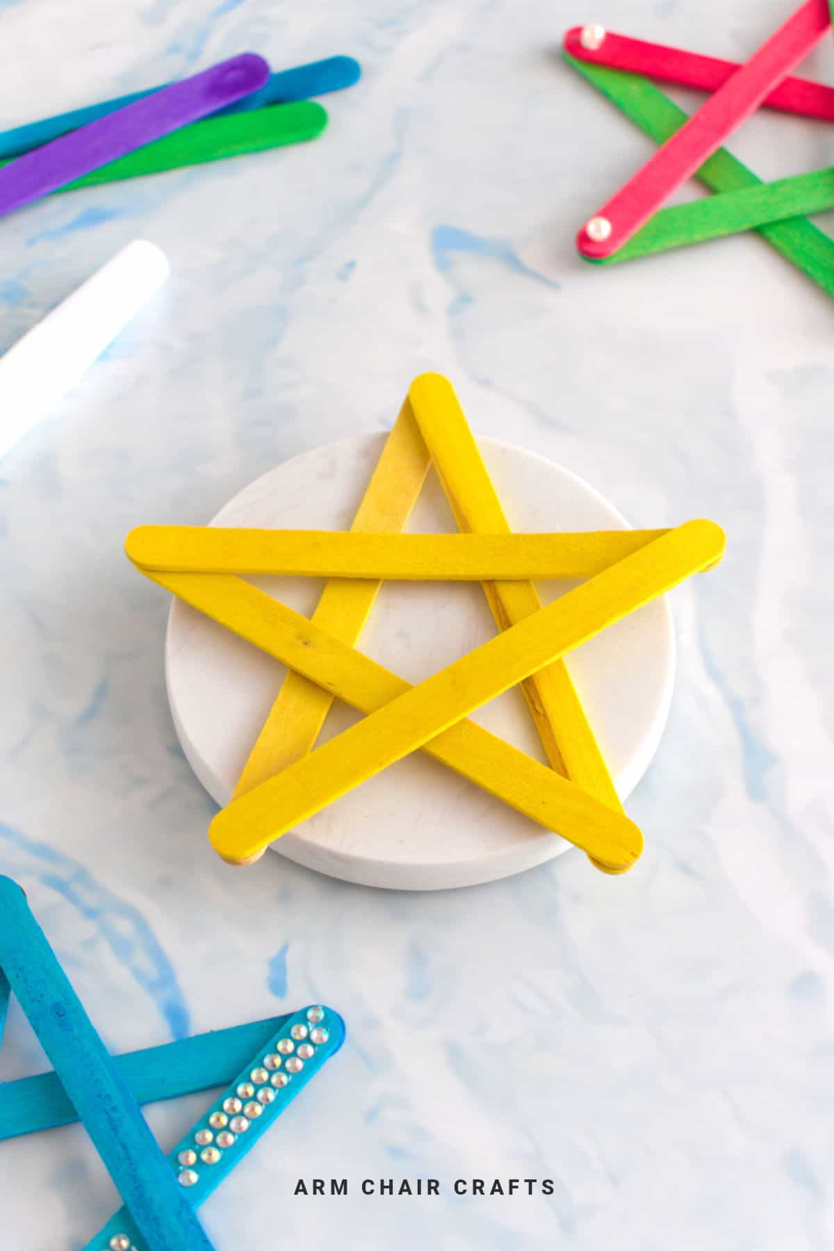 Yellow popsicle wooden star.