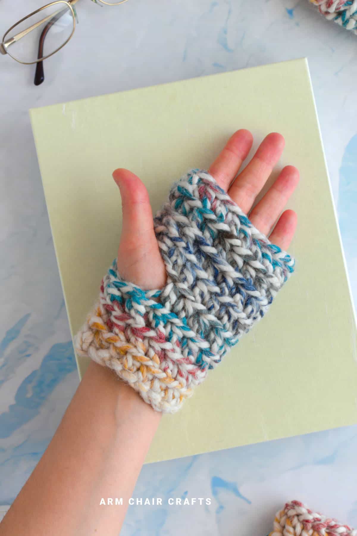 Chunky crochet glove.