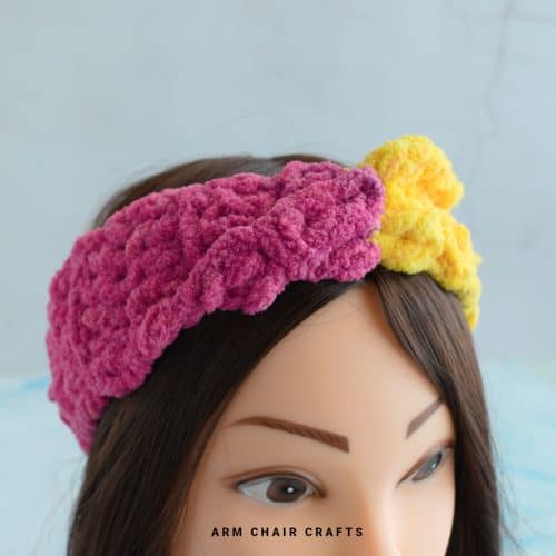 Crochet headband with twist.