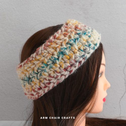 Close up image of a crochet headband.