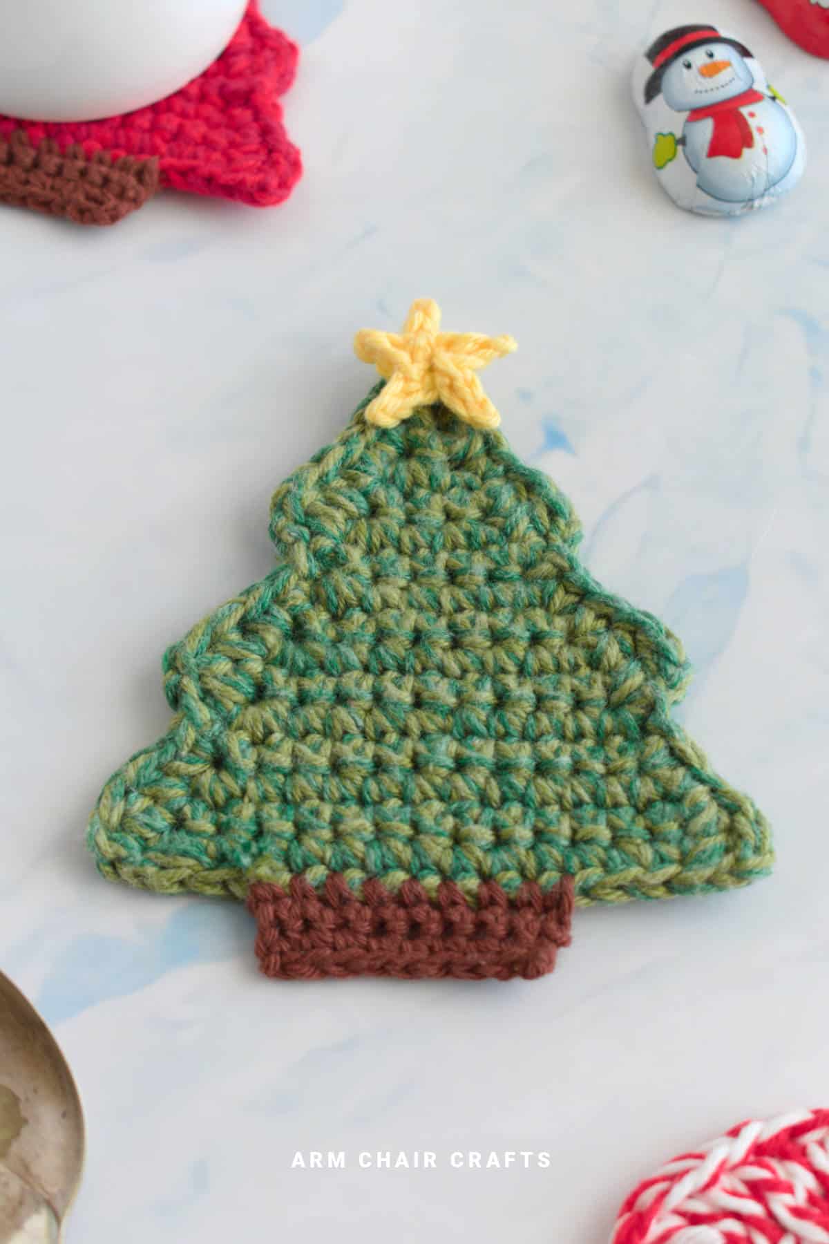 Close up image of a crochet coaster.