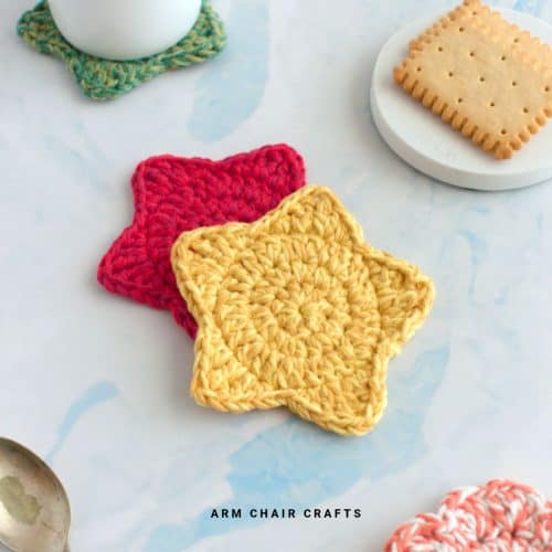 Close up image of crochet star coasters.