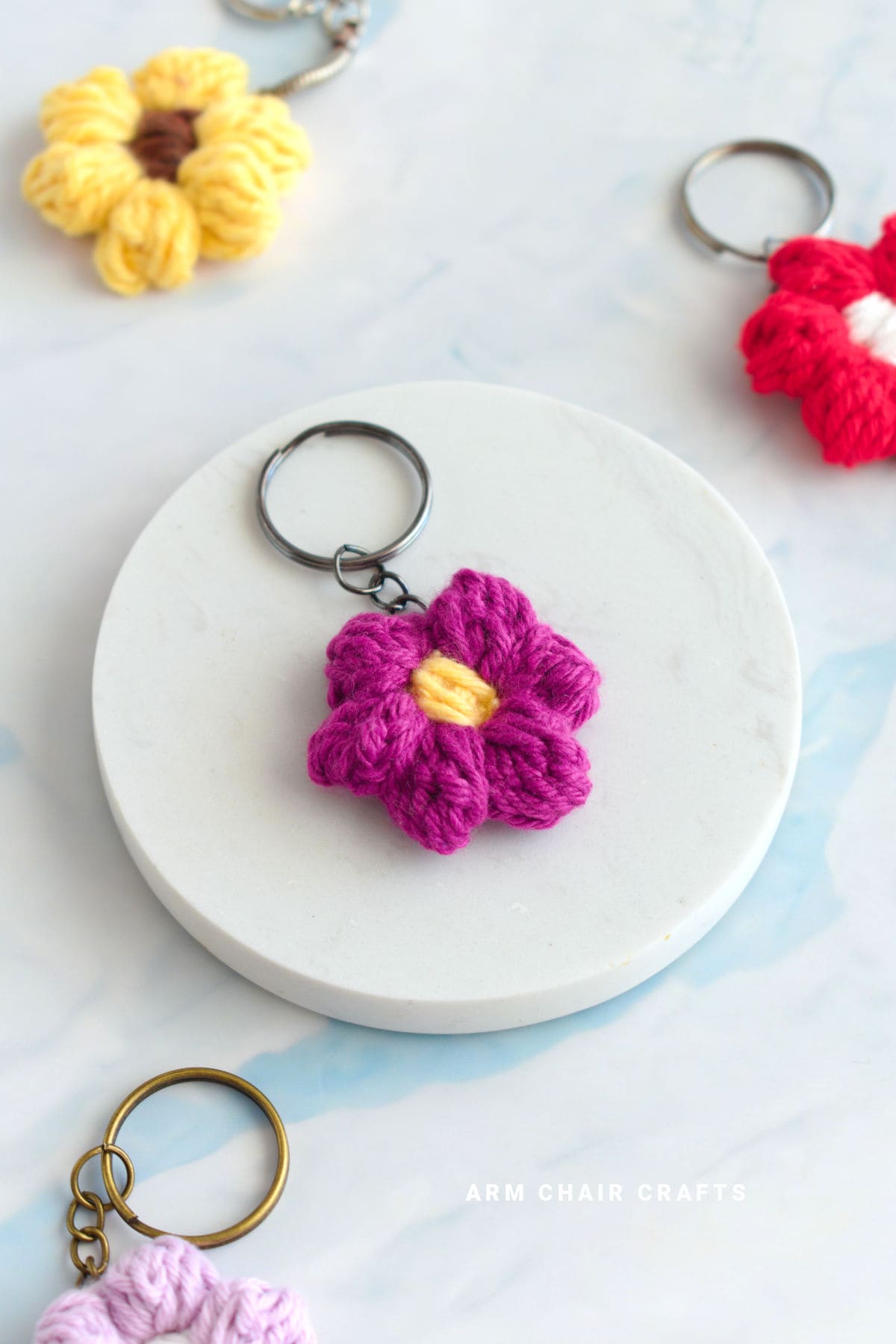 Pink flower crochet keychain.