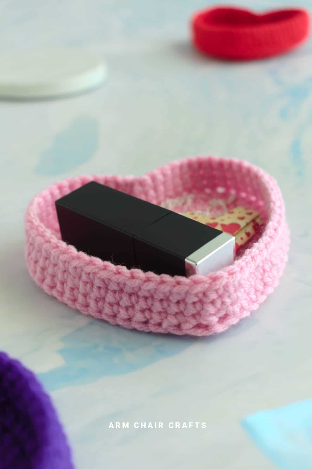 Pink crochet heart trinket box.