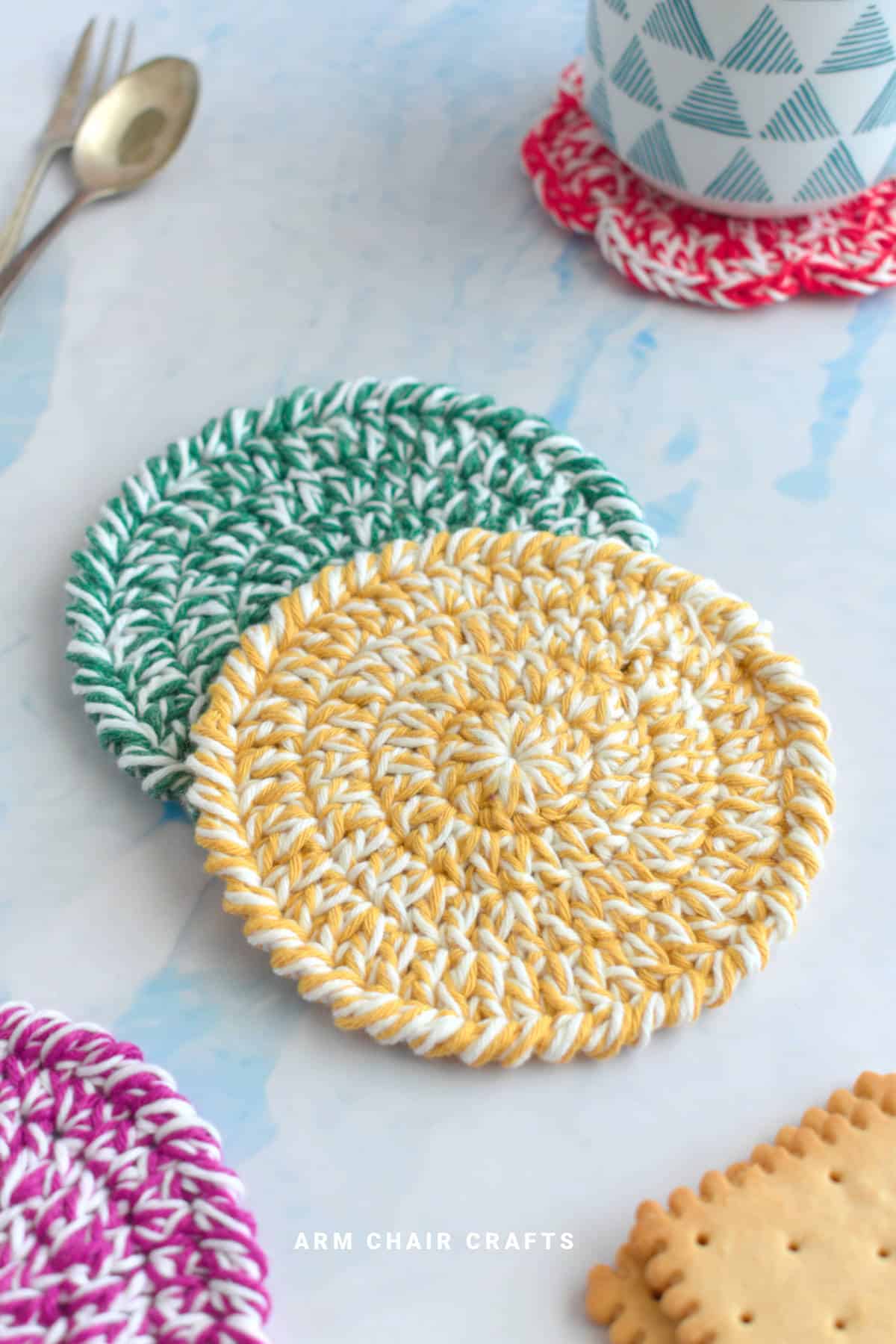 Yellow and green crochet coasters.