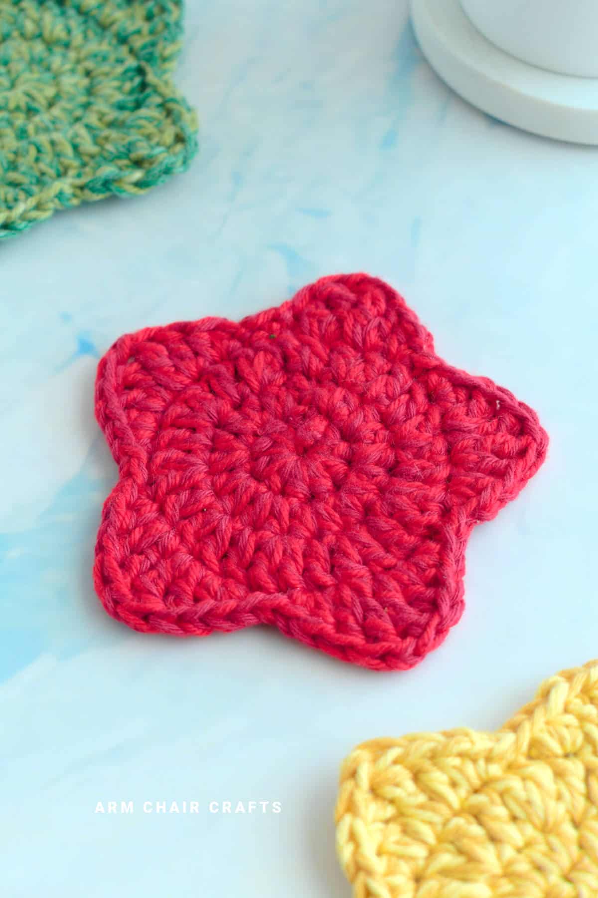 Red star crochet coaster.