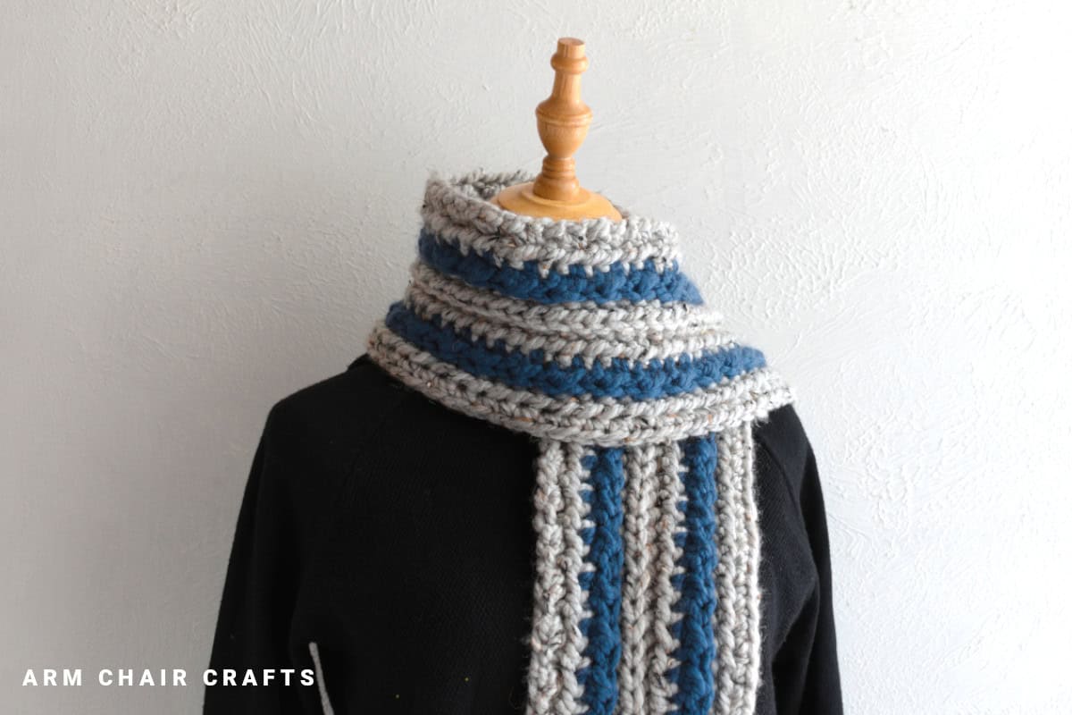 Close up image of a crochet scarf.