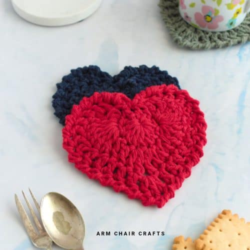Red and blue crochet heart coasters.