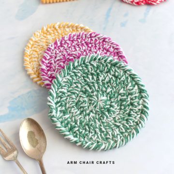 Close up image of round crochet coasters.
