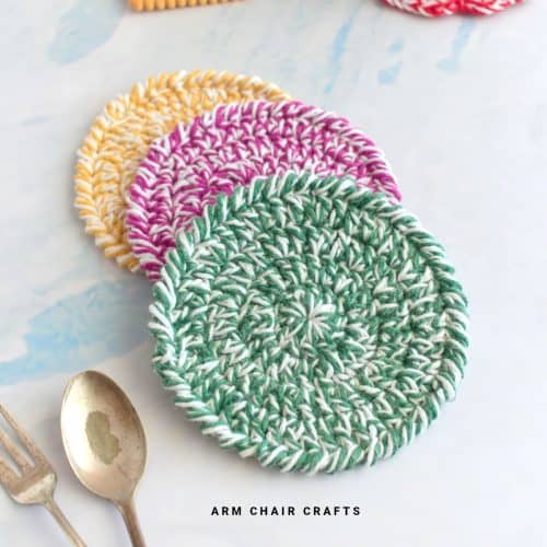 Close up image of round crochet coasters.