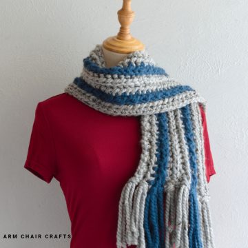 Crochet scarf with fringe.