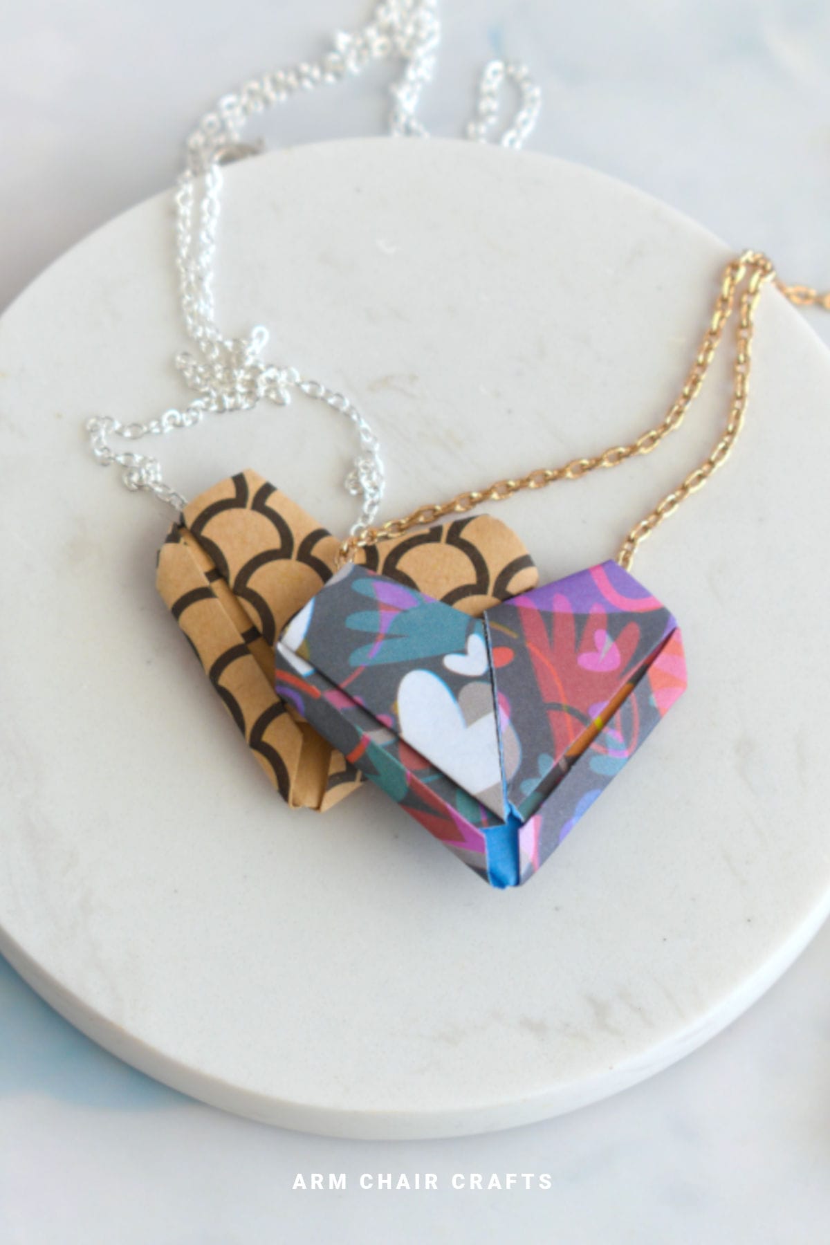 Close up image of paper heart necklaces.