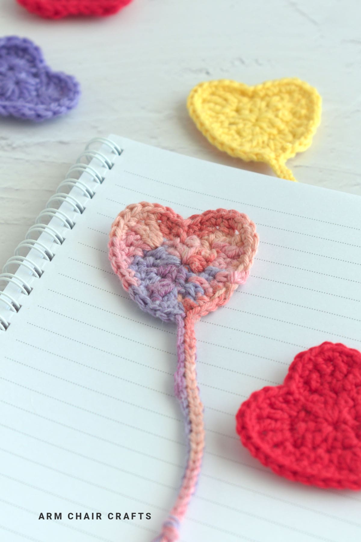 Close up image of crochet heart bookmarks.