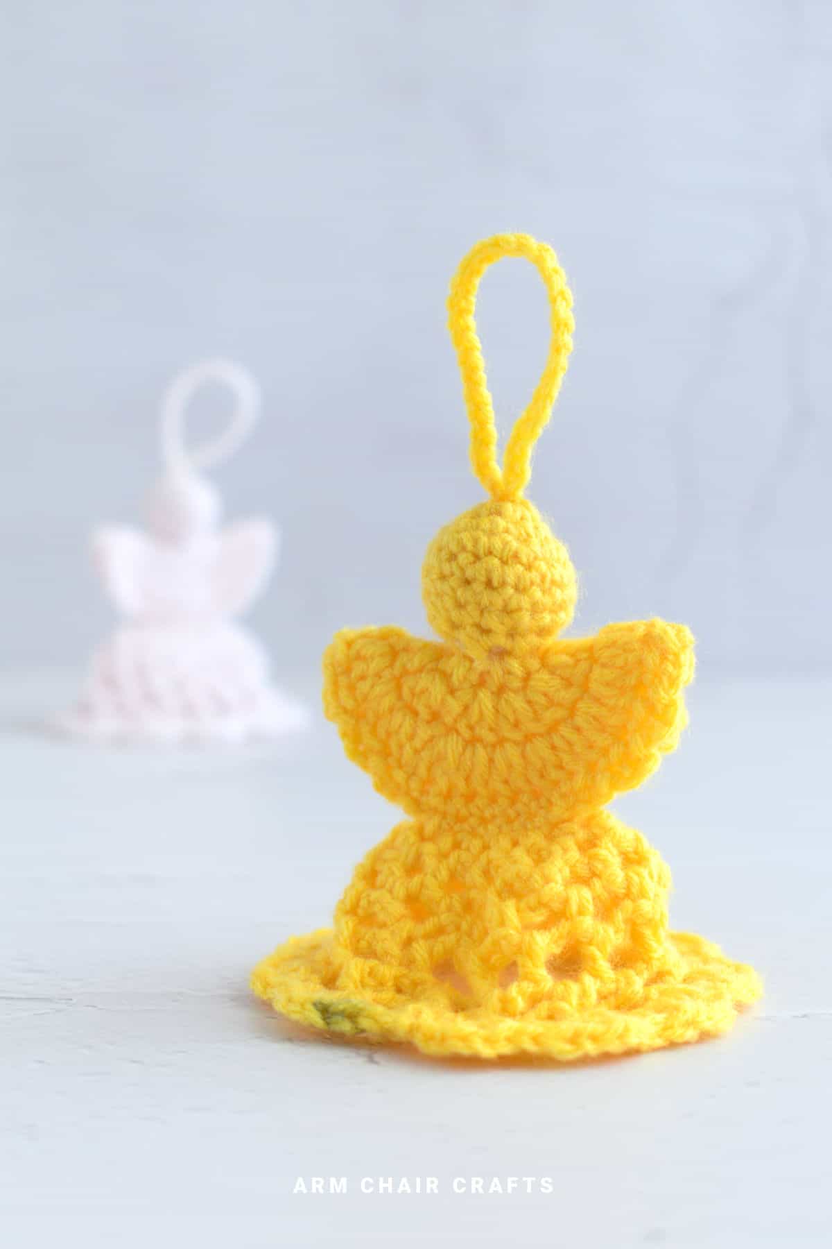 Yellow crochet angel.