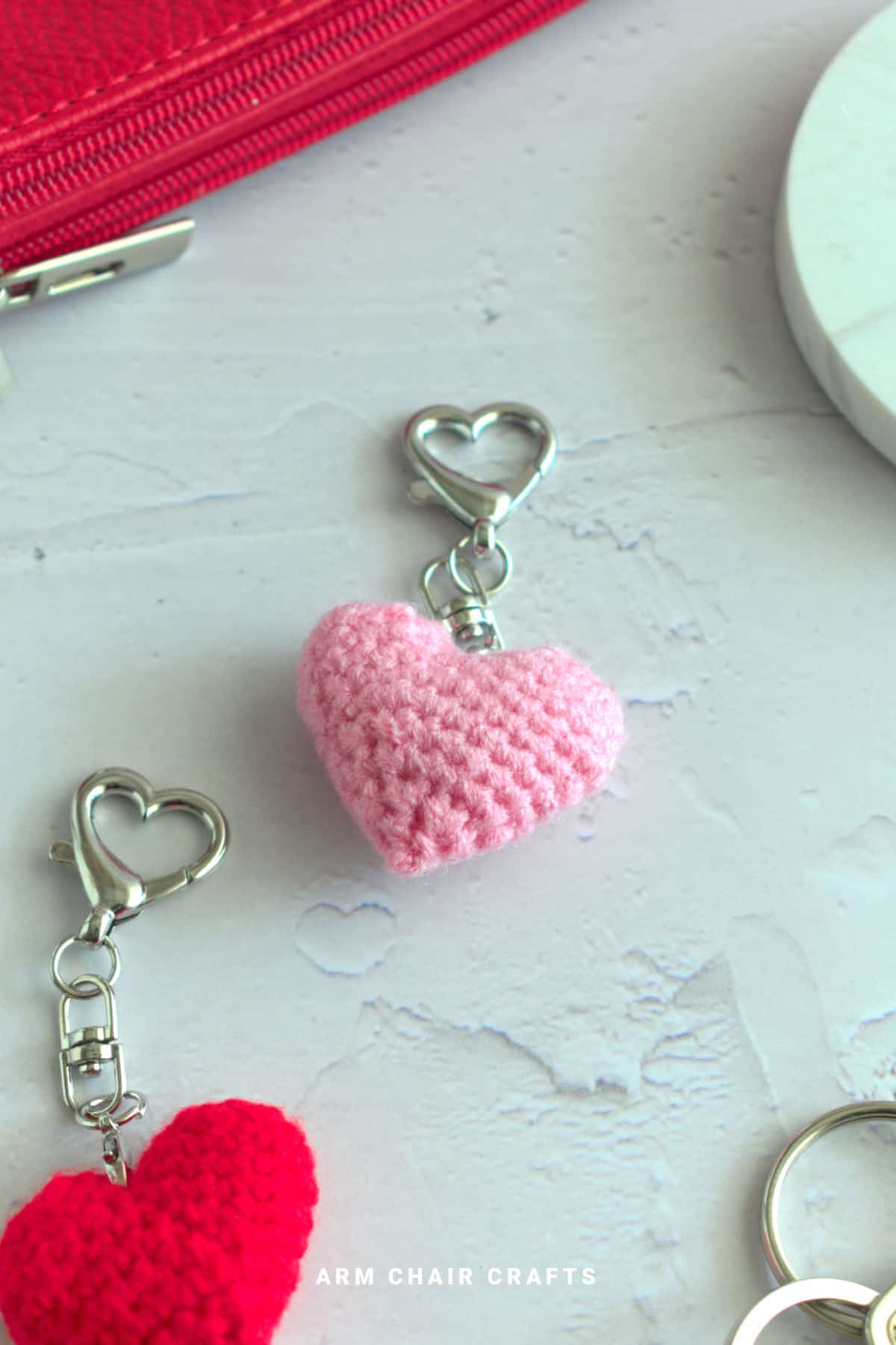 Pink crochet heart keychain.