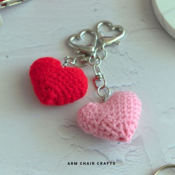 Close up image of crochet heart keychains.