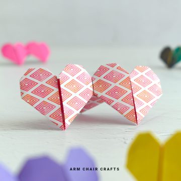 Red and white origami hearts.
