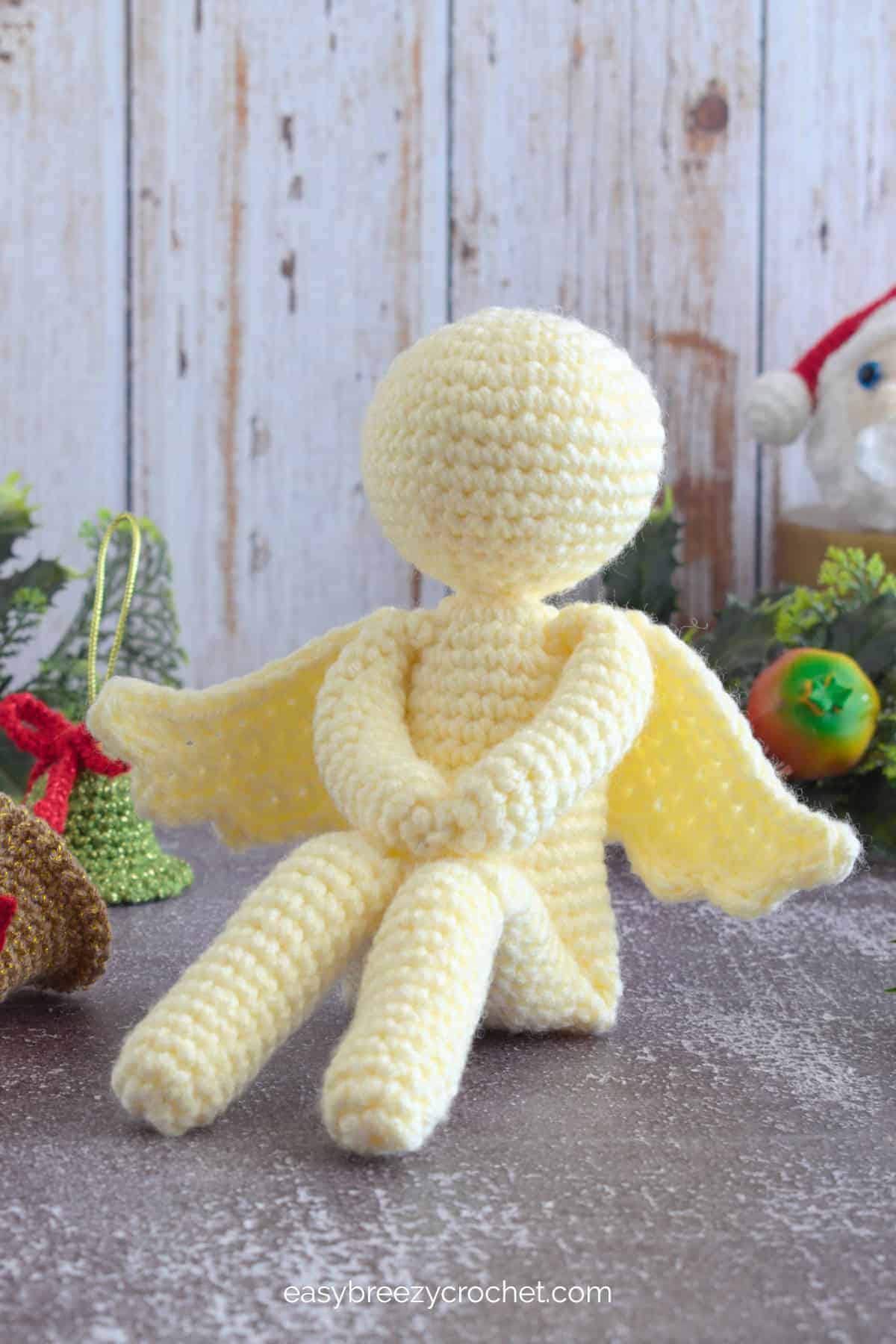 Sitting crochet angel.