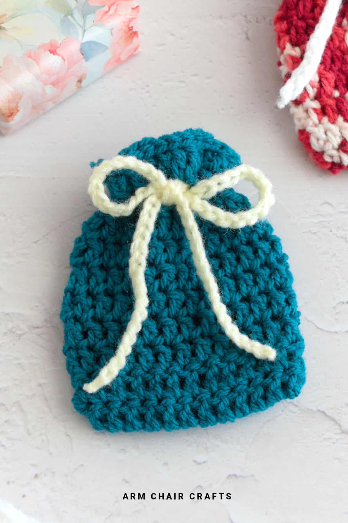 Blue crochet pouch.