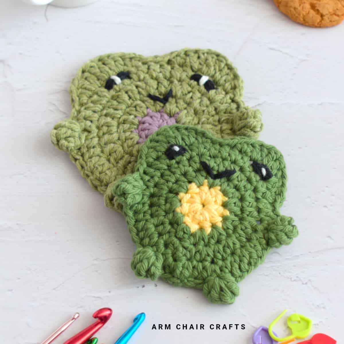 Close up image of crochet frog coasters.