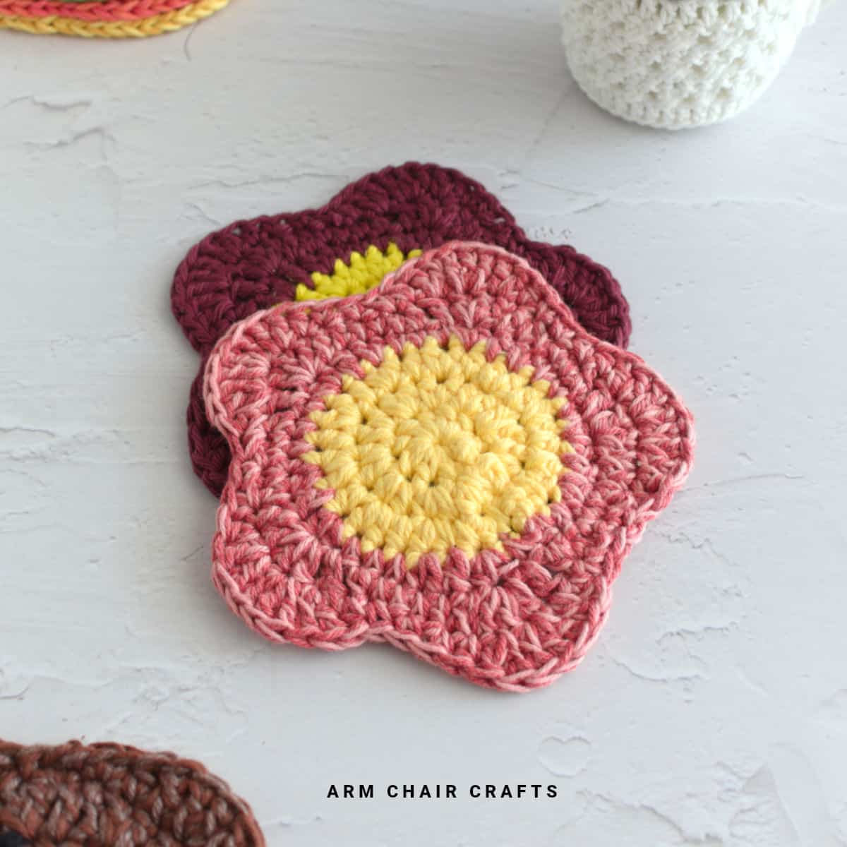Close up image of crochet flower coasters.