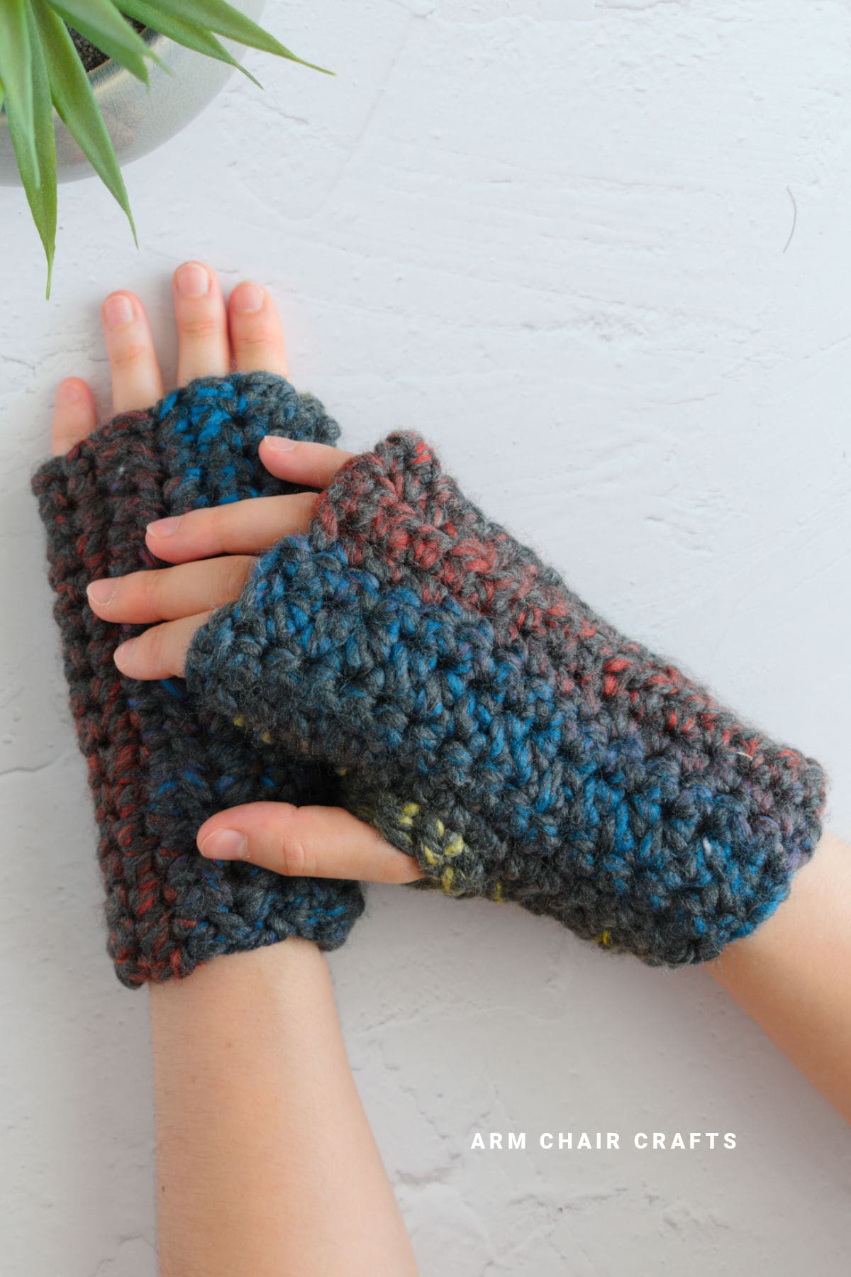 Close up image of crochet gloves.