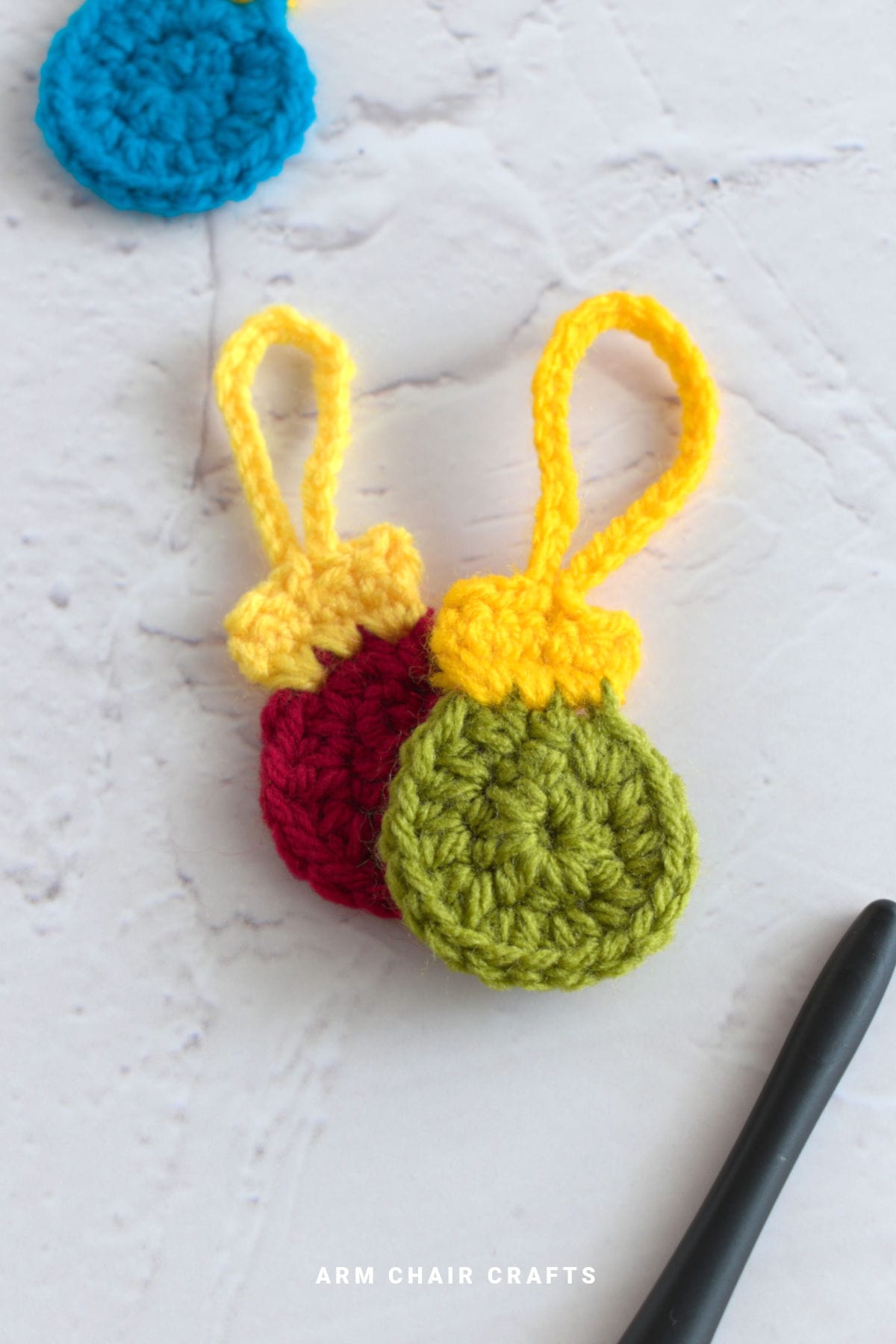 Crochet bauble applique.