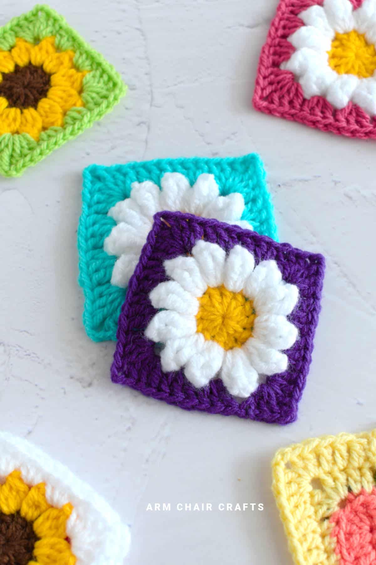 Close up image of crochet granny squares.