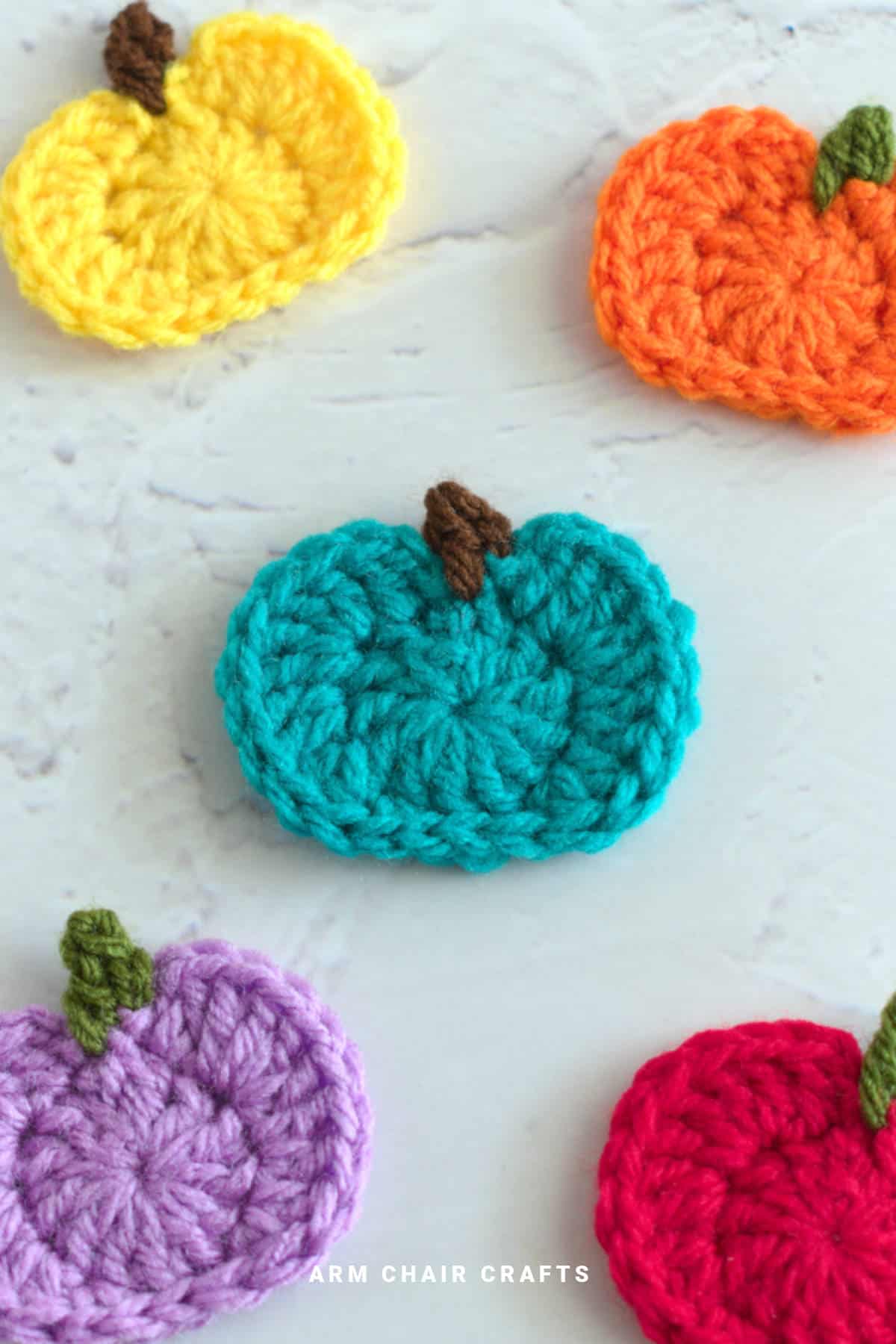 Crochet pumpkin motifs.