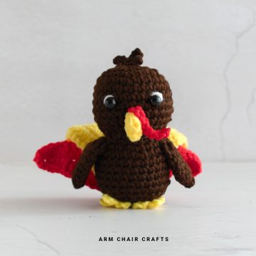 Close up image of an amigurumi turkey.