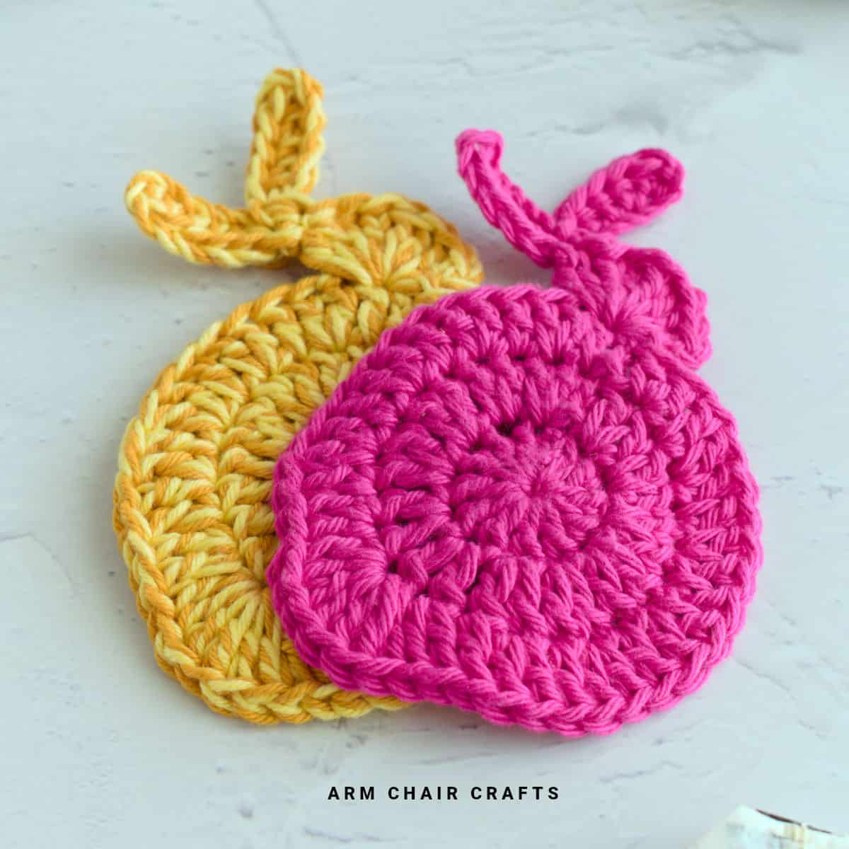 Close up image of crochet bunny coasters.